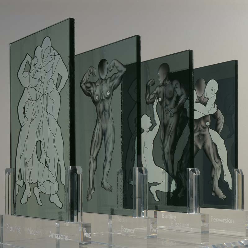 Sculpture of four translucent gray rectangles each with illustrations of nude bodies in various poses on a clear plinth