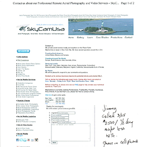 Printout of a webpage with contact information and handwritten annotations in black ink