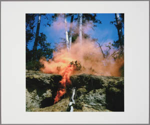 Print of a plume of orange smoke rising from a hole in the ground in a forest