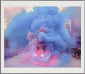 Print of a large cloud of purple smoke rising from a lighted rectangle flanked by crowds of people