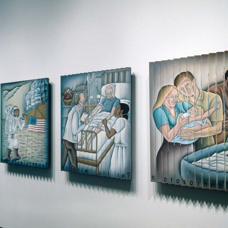 Color photograph of four square artworks with healthcare, animal, and astronaut imagery on a white wall