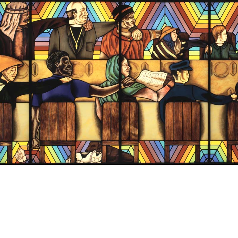 Detail of a stained glass work with people of different faiths and races seated around a long table