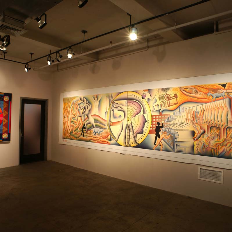 Color photograph of two paintings installed on adjacent walls in a gallery