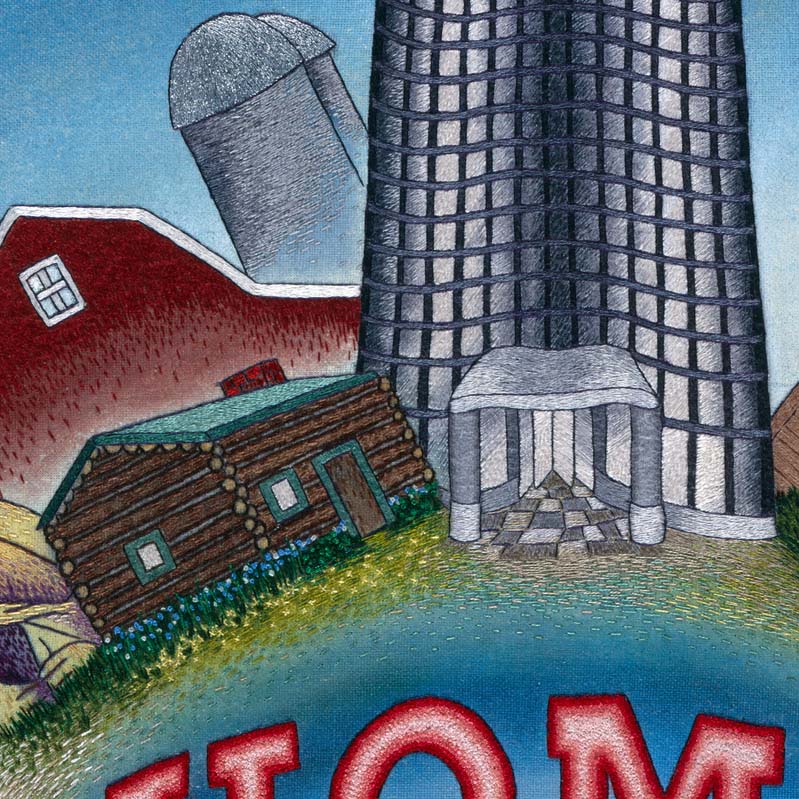 Color embroidery of the word Home below an assortment of buildings
